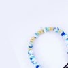 PULSERA UNISEX EN ORO Y NOPRENO AZUL - Imagen 2