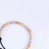 PULSERA MUJER EN TRES OROS Y CORDON - Imagen 2