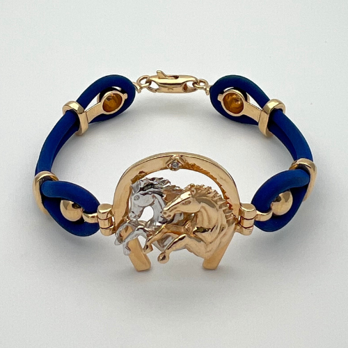 PULSERA DIJE HERRADURA CABALLOS Y CAUCHOS AZULES EN DOS OROS DE 18K