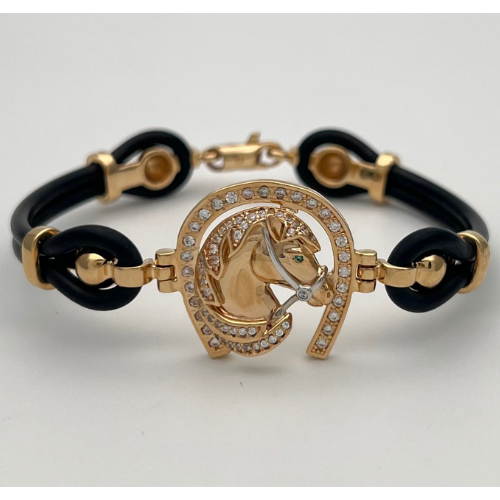 PULSERA DIJE HERREDURA CABALLO Y CAUCHOS NEGROS EN DOS OROS DE 18K