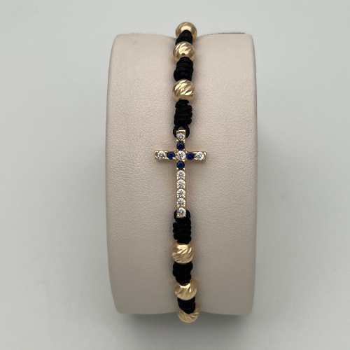 PULSERA TEJIDA CON DIJE CRUZ Y BALINES DIAMANTADOS EN ORO DE 18K