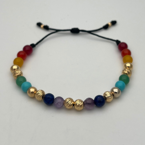 PULSERA TEJIDA SIETE CHAKRAS Y BALINES EN ORO DE 18K