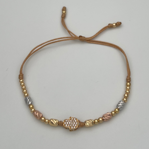 PULSERA TEJIDA CON DIJE MANO DE FÁTIMA, BALINES Y CANITILLOS DIAMANTADOS EN TRES OROS DE 18K