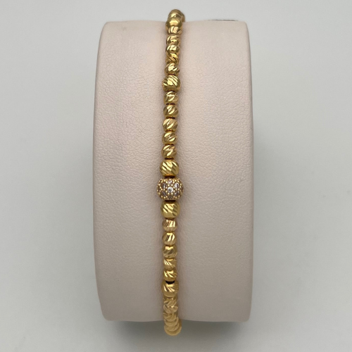 PULSERA TEJIDA CON DIJE BOLA DE FUEGO Y BALINES DIAMANTADOS EN ORO DE 18K