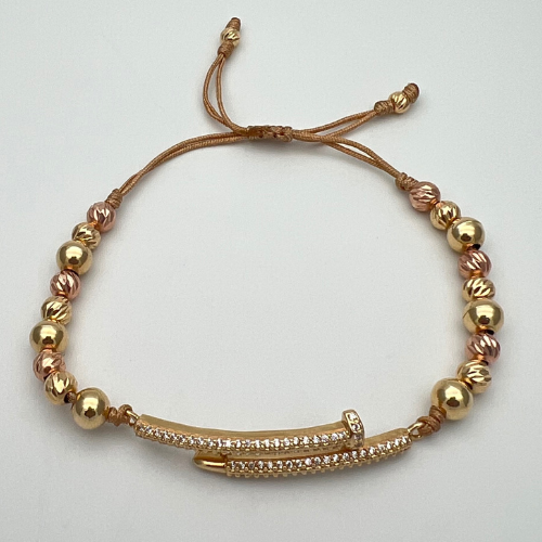 PULSERA TEJIDA CON DIJE CLAVO Y BALINES EN ORO DE 18K