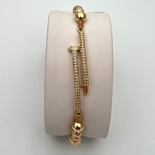 PULSERA TEJIDA CON DIJE CLAVO Y BALINES EN ORO DE 18K