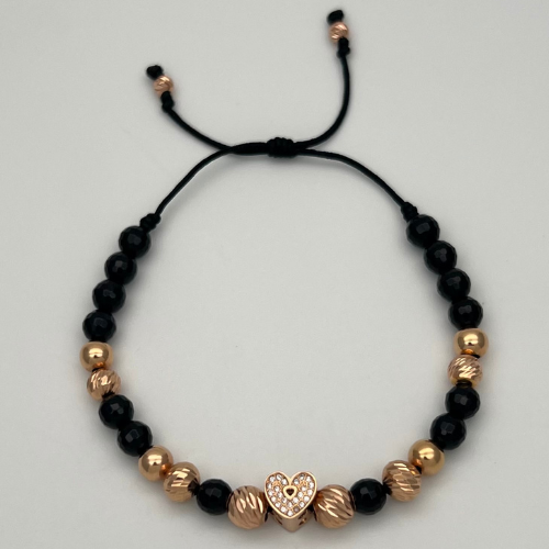 PULSERA TEJIDA CON DIJE CORAZÓN Y BALINES EN ORO ROSA DE 18K