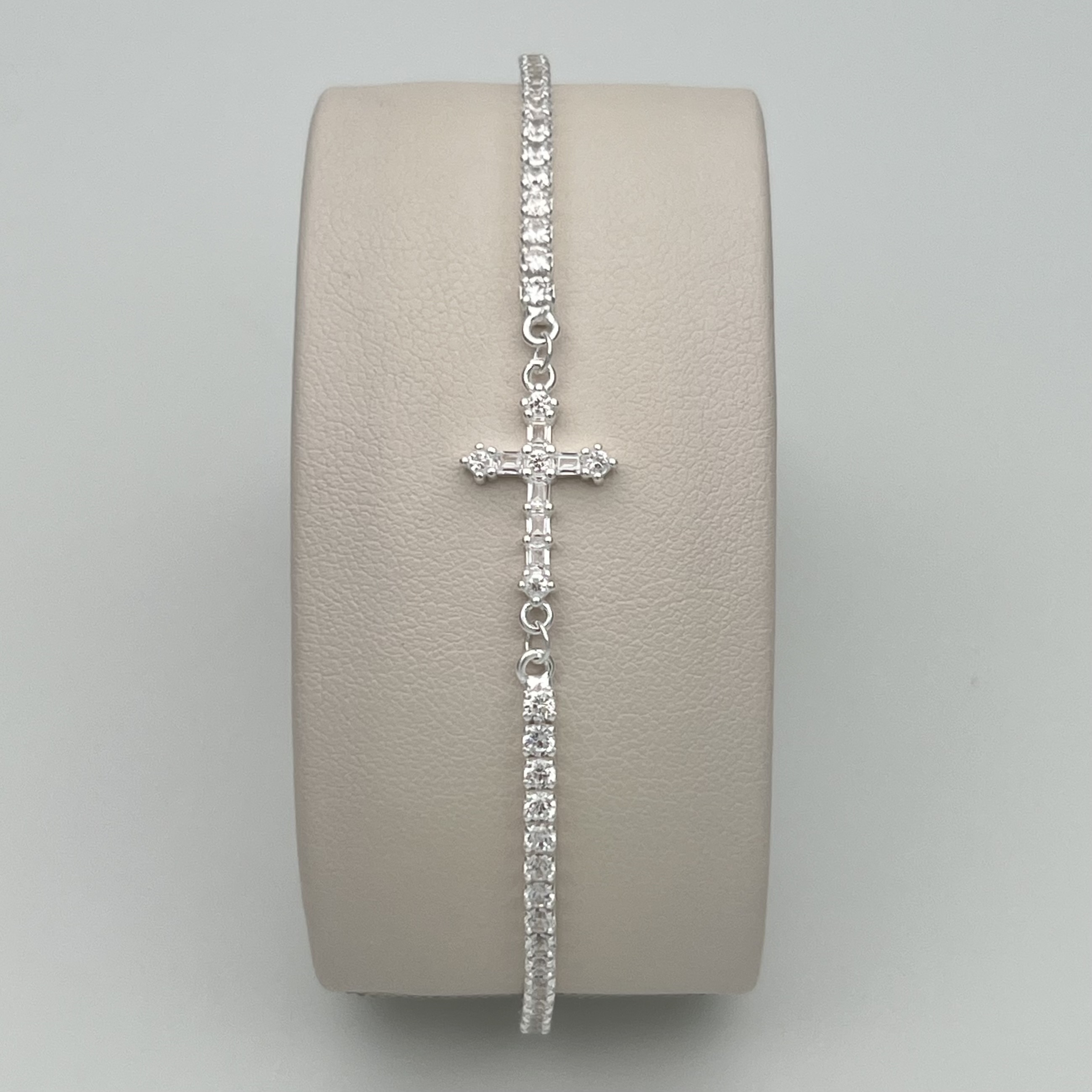 PULSERA CRUZ CON CIRCONES EN PLATA