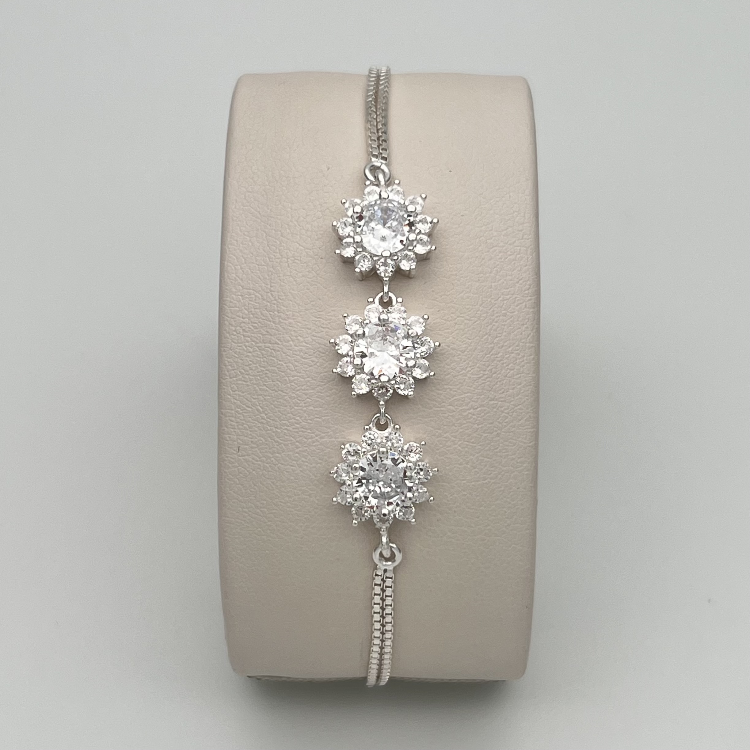 PULSERA FLORES CON CIRCONES EN PLATA